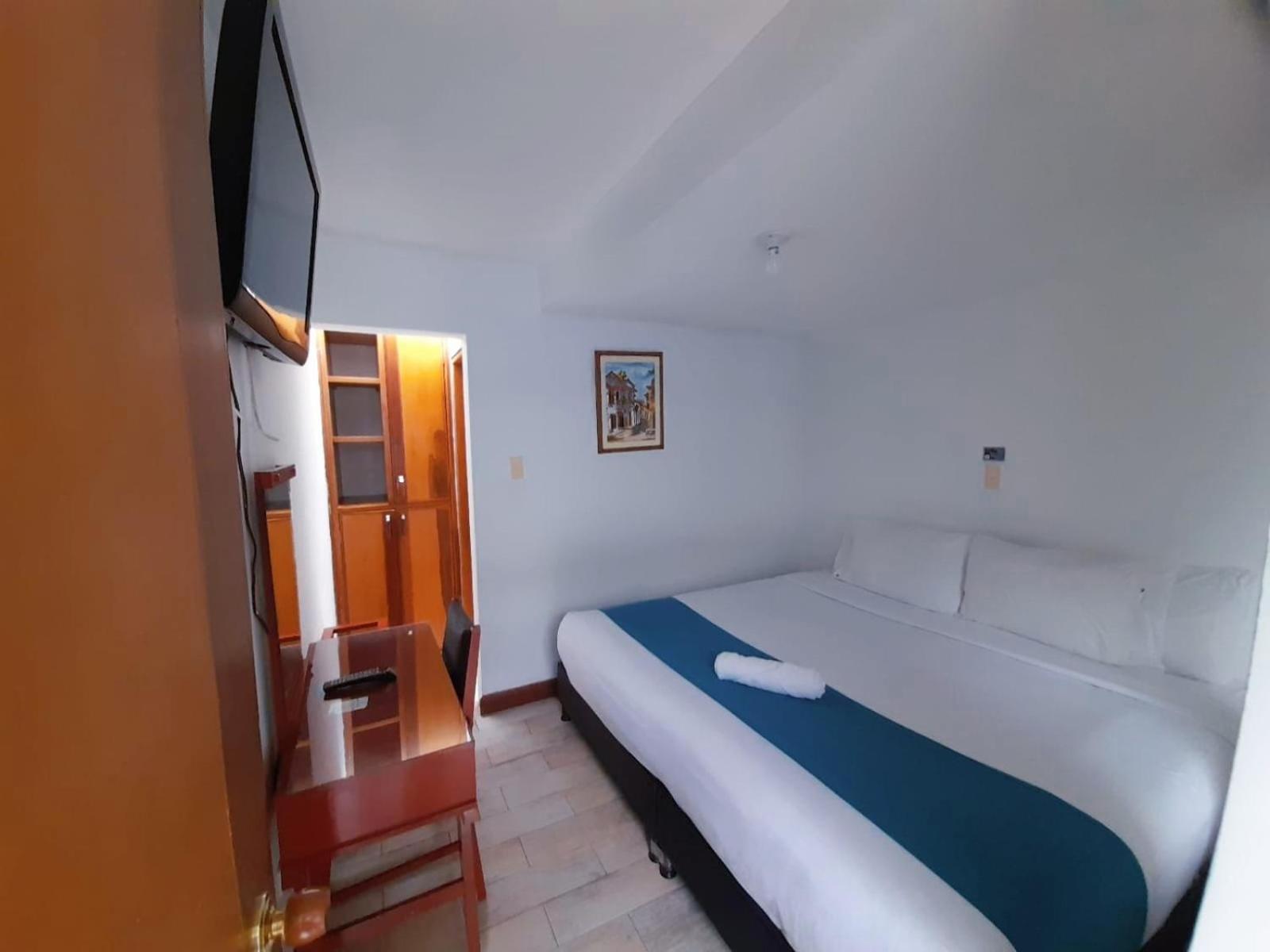 Hotel El Cid Plaza Premium Tunja Quarto foto